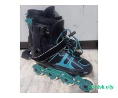Коньки роликовые