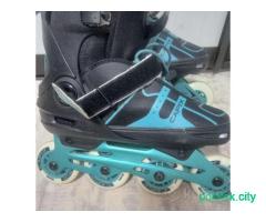 Коньки роликовые