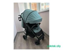 Детская прогулочная коляска