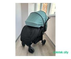 Детская прогулочная коляска