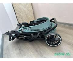 Детская прогулочная коляска