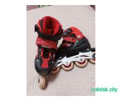 Роликовые коньки