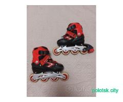 Роликовые коньки