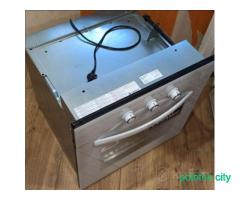 Новый газовый духовой шкаф